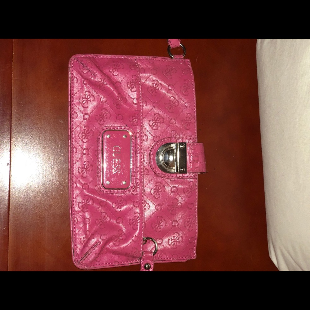 Guess pink clutch in good condition